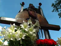 wooden cross with flowers